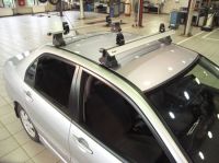 Багажник для Nissan Tiida седан (прямоугольная дуга) (Фото 2)