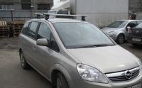 Багажник для Opel Astra Family с 2010г.- (аэродинамическая дуга) арт.8709+8827+8753 (Фото 4)